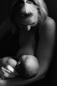 Katie breastfeeding PBJ during her newborn photos